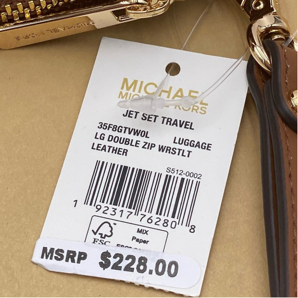 Michael Kors DoubleZip Wallet
Wristlet Luggage - Picture 10 of 10